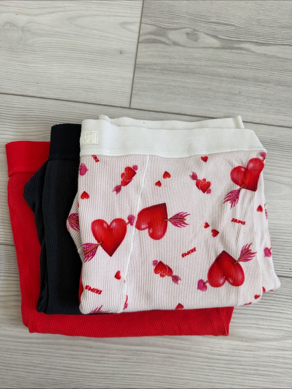 SKIMS Heart Print Ribbed Cotton Bottoms in White, Red, Black